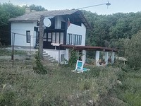 A house for sale with a unique forest panorama close to the sea