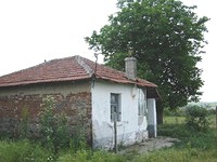 Small Rural House At The End Of A Village