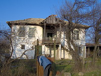 House with large plot for sale near a beach resort